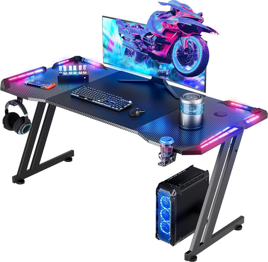 HLDIRECT 55 Inch Gaming Desk with LED Lights Carbon Fibre Surface Gaming Table Large Computer Desk Ergonomic Home Office Desks Z Shaped PC Gamer Workstations with Cup Holder & Headphone Hook Black