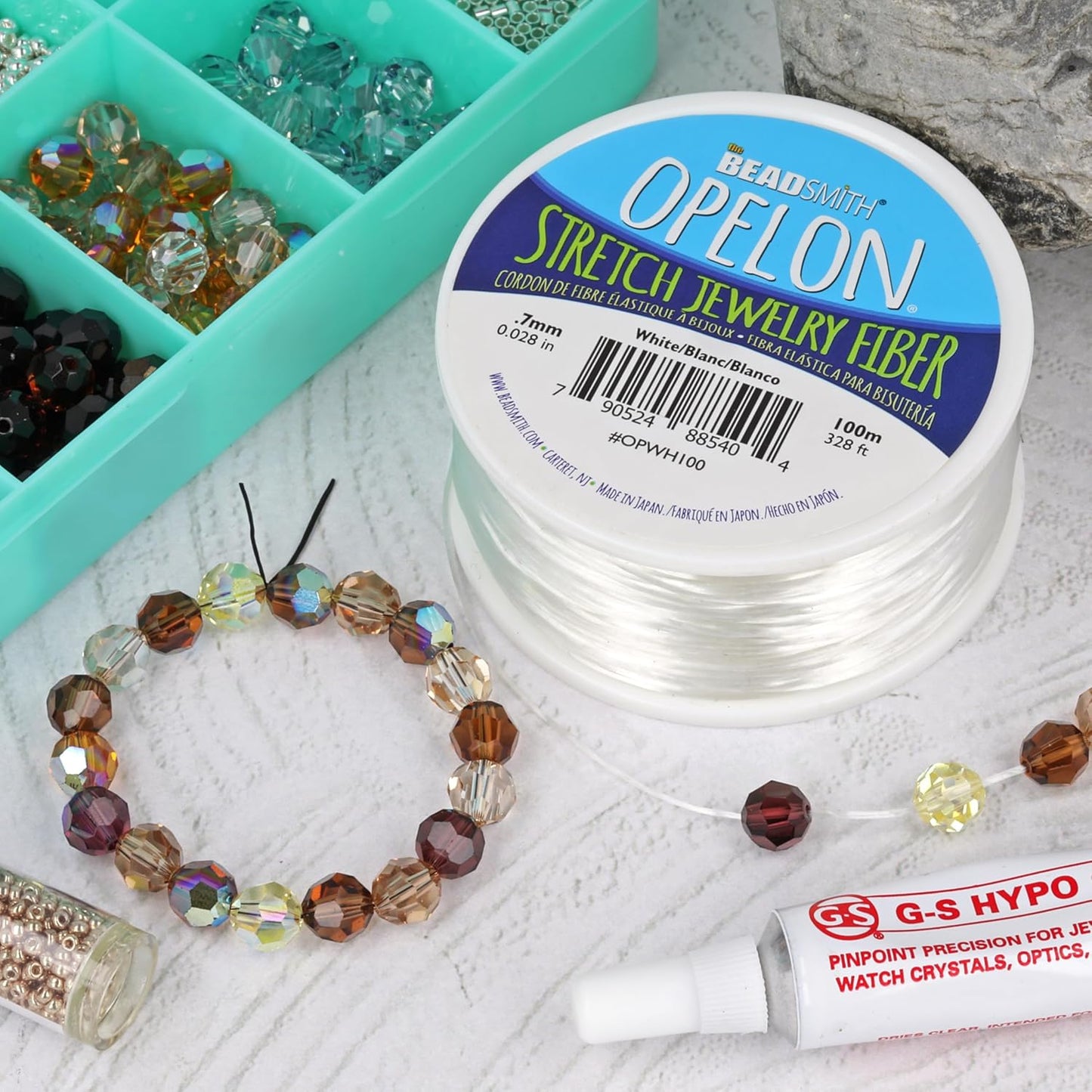 The Beadsmith Opelon Stretch Cord – Elastic Beading Fiber, White, 0.7 mm Diameter, 100 Meters (328 ft) Spool